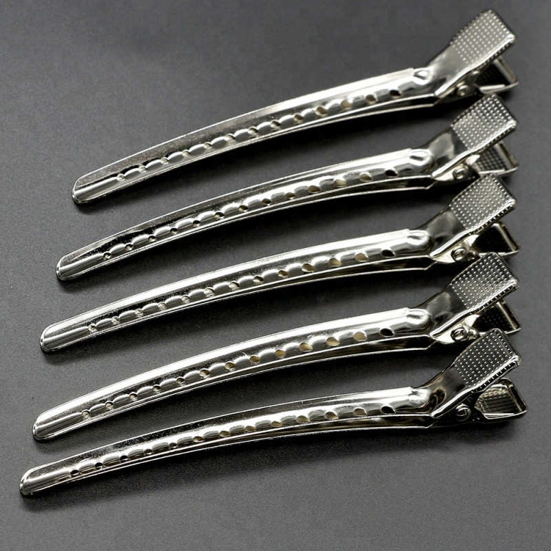 Klipsy klamry fryzjerskie metalowe do włosów 10,5 cm 12 szt. Klipsy klamry fryzjerskie metalowe do włosów 10,5 cm 12 szt.